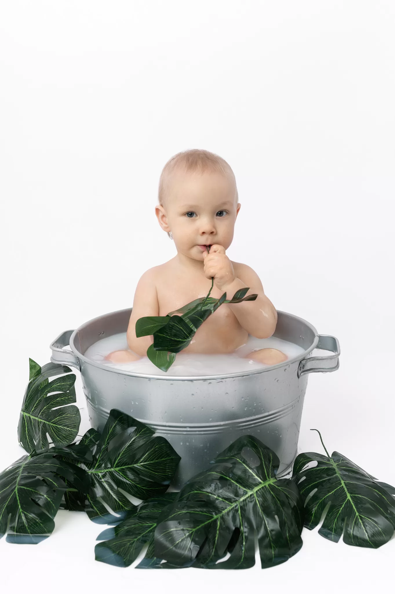 Babyfoto-mjölbadsfotografering