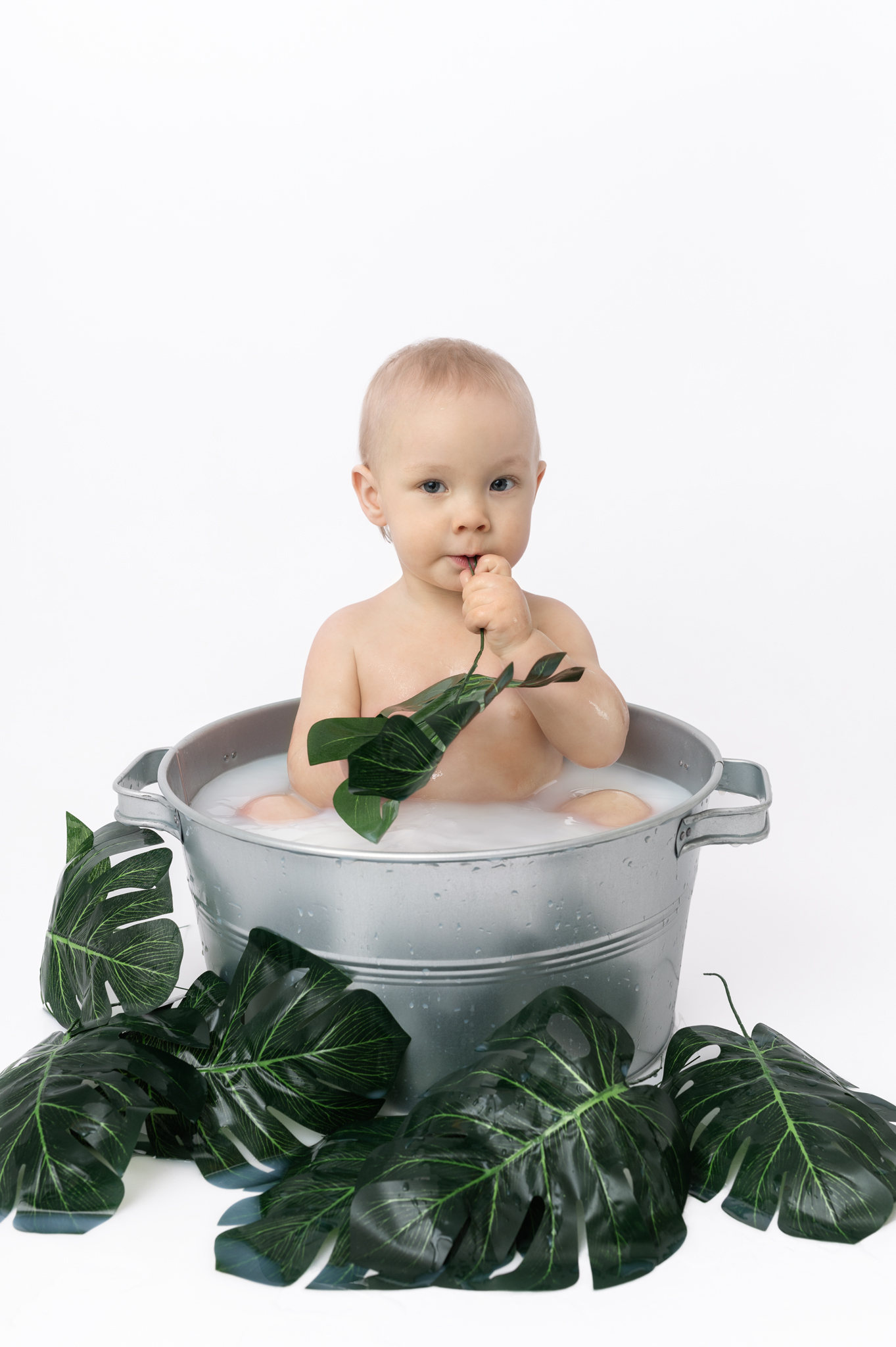 Babyfoto-mjölkbadsfotografering